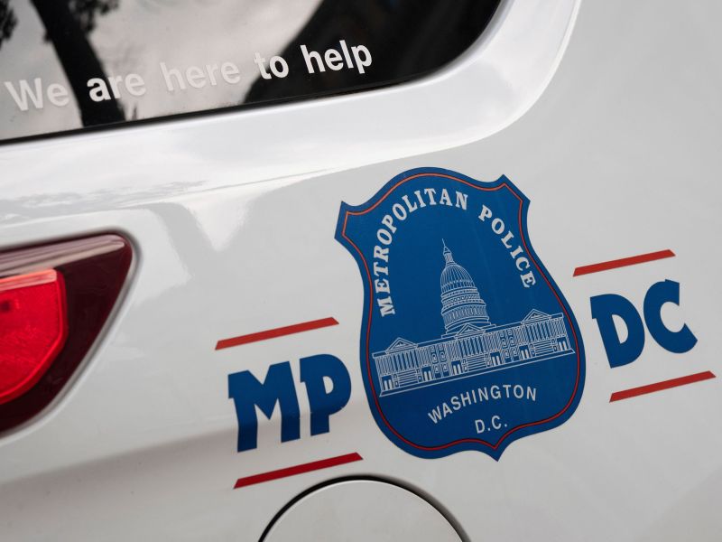 A Washington Metropolitan Police Department logo is pictured on a vehicle in downtown Washington, DC.